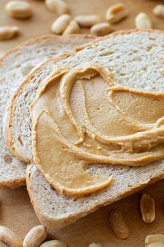 peanut butter spread on top of some bread