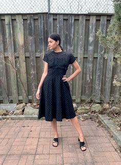 "Awesome cotton eyelet 50s Party Dress in a rare larger size. This beauty has a delightful fit and flare cut, peek-a-boo eyelet upper bodice and a sweet black satin band and bow at the empire waist. Attached black satiny lining from mid bodice down. There is boning in behind the lining at the bust darts for a more structured fit. Full swinging skirt can be worn with or without a crinoline. Long zipper up the back. 3 hook and eyes along the zipper that conceals the zip nicely. Satin piping along Fitted Eyelet Dress Midi Length, Fitted Eyelet Midi Dress, Fitted Eyelet Dress, Midi Length, Fitted Eyelet Dresses For Party, Fitted Party Dress With Broderie Anglaise, Fitted Broderie Anglaise Dress For Party, Fitted Broderie Anglaise Party Dress, 50s Party Dress, Cotton Party Dress