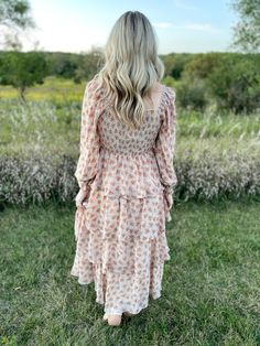 Indulge in romance with our Tilly Smocked Tiered Floral Maxi Dress! This vintage cream dress features a feminine, floral chiffon print and a flattering square neckline. The smocked bodice and tiered paneling create a figure-flattering silhouette, while the voluminous smocked sleeves add a touch of whimsy. With full lining, you'll feel confident and comfortable all day long. Don't miss out on this dreamy dress! True to size Model is 5'4 and wearing a small Self: 100% Polyester, Lining: 100% Rayon Maxi Dress Vintage, Mobile Boutique, Blowout Sale, Dreamy Dress, Vintage Maxi Dress, Floral Chiffon, Cream Dress, Dress Vintage, Floral Maxi