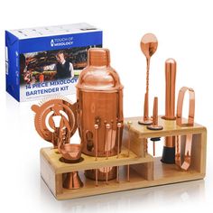 a set of copper colored kitchen utensils on a wooden stand with a box in the background