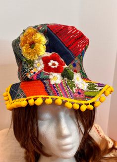 This hat is made sustainably, it is crafted from some vintage clothing and table linens.   The hat is patchwork and it is embellished with an appliqué on the front. Great costume piece or just to wear at that next festival. the hat measures 21 inches Sea Character, Bohemian Hat, Patchwork Bucket Hat, Top Hat Costume, Rave Hats, Hippie Hat, Canvas Hat, Colorful Hat, Boot Bling