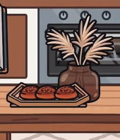 a potted plant sitting on top of a wooden table next to some hot dogs