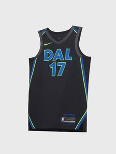 a basketball jersey with the word dal 17 on it in blue and green, against a white background