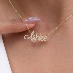 "This 14k personalized diamond name necklace is the perfect gift for the bridal party, someone special, or yourself.  How to order 1- Pick the fonts you like and send us a message 2- We will send you a picture of your name with the fonts you chose 3- If you like it any of them, place your order. 4- We send a final 3d mock up for approval. 5- Once approved we go ahead and finish your necklace. M A T E R I A L & L E N G T H Available in 14k Yellow Gold, 14k Rose Gold, 14k White Gold, Sterling Silver Stone: Natural Diamonds Thickness: 1.3mm / 0.05\" Initials Lowercase: 4-6 mm (Depending on the font) Capital: 9-12 mm (Depending on the font) Diamond weight: 0.15 ct. - 0.70 ct. depending on the name Chain Length:  14+2, 16+2 options or any length up to 20 inches without extension. (Please leave Elegant Customized Name Necklace For Anniversary Gift, Customizable Elegant Name Necklace For Anniversary, Elegant Name Necklaces For Anniversary Gift, Elegant Personalized Name Necklace For Anniversary, Elegant Customizable Necklace For Anniversary Gift, Elegant Customizable Necklace For Anniversary, Name Pendant Necklaces For Weddings, Custom Gold Necklace With Names For Wedding, Custom Gold Wedding Necklace With Names