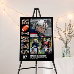 a football poster is displayed on an easel in front of a decorated christmas tree