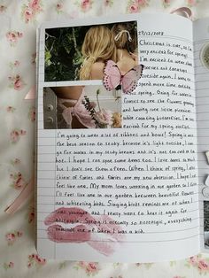 an open book with pink flowers and butterflies on it