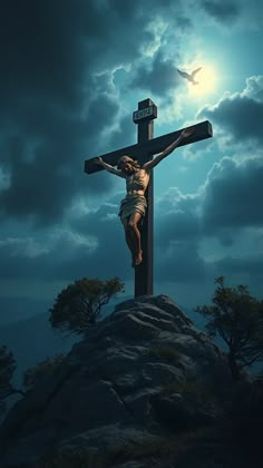 the crucifix is on top of a hill