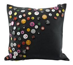 a black pillow with buttons on it