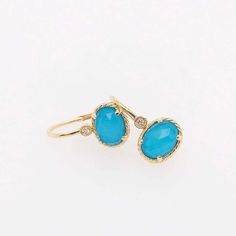 These 14kt yellow gold, adorable turquoise and diamond earrings are bold and beautiful! With a genuine piece of natural turquoise set under a faceted clear quartz gemstone. The clear quartz adds an extra layer to the turquoise and makes the overall appearance more sparkly and bold. The turquoise is an oval shape set horizontally in a gold bezel that has a twisted texture. On top of each bright blue turquoise piece there is round brilliant diamond! The diamonds add character and class to these ea Elegant Turquoise Faceted Earrings, Elegant Faceted Turquoise Earrings, Turquoise Diamond Earrings, Diamond Dangle Earrings, Bold And Beautiful, Natural Turquoise, Rock Crystal, Diamond Crystal, Clear Quartz