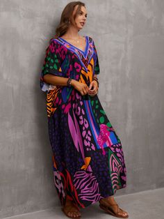 In limited supply!!! Vibrantly printed v-neck mid-sleeve mu-mu loose fit dress kaftan maxi dress. Beautiful styles to choose from. Easy & effortless to wear.

In-Stock Item: 2-day processing. Shipped in 4-7 days. Vibrant Print V-neck Kaftan For Beachwear, Multicolor Flowy V-neck Maxi Dress, Multicolor Abstract Print V-neck Maxi Dress, Multicolor V-neck Kaftan For Vacation, Patterned V-neck Maxi Dress, Colorful Floral Print V-neck Maxi Dress, V-neck Beach Dress With Abstract Print, Patterned V-neck Maxi Dress With Vibrant Print, Multicolor Printed Half Sleeve Dress