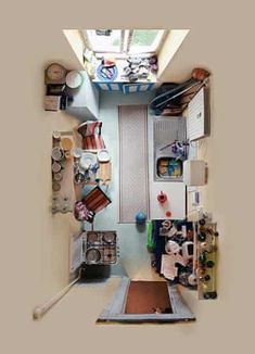 an overhead view of a kitchen with lots of clutter