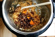 the food is being cooked in the pot on the stove