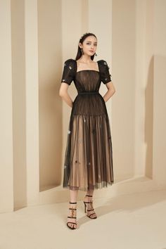 Aniston Pleated Puffy Sleeved Mesh Sheer Dress | MEAN BLVD Short Sleeve Tulle Skirt Party Dress, Short Sleeve Tulle Party Dress, Organza Midi Dress With Sheer Bodice For Evening, Organza Midi-length Evening Dress, Luxury Fitted Pleated Evening Dress, Organza Midi Length Evening Dress, Organza Evening Dress, Midi Length, Evening Organza Knee-length Dress, Evening Sheer Short Sleeve Midi Dress