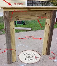 a wooden table with measurements for the top and bottom section, including an attached sign