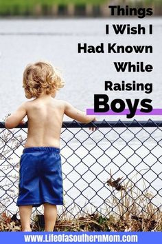 a little boy standing next to a fence with the words, things i wish i had known while raising boys