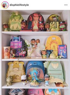 the shelves are filled with many different disney princess backpacks and purses on them