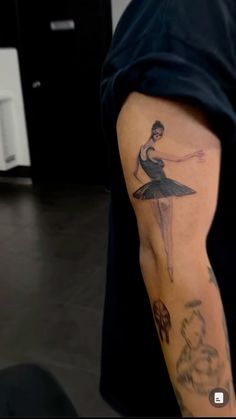 a person with a tattoo on their arm