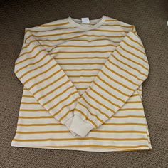 Soft Yellow White Striped Never Worn Striped Long Sleeve Sweatshirt For Winter, Striped Long Sleeve Ribbed Sweater, Cozy Fit Cream Cotton Sweater, Striped Long Sleeve Soft Knit Sweater, Cream Cotton Top With Cozy Fit, Cream Cozy Fit Long Sleeve Sweatshirt, Striped Long Sleeve Soft Knit Top, Casual Striped Long Sleeve Sweater, Cream Long Sleeve Top With Cozy Fit