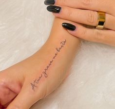 a woman's foot with a tattoo that reads, i love you to the moon and back