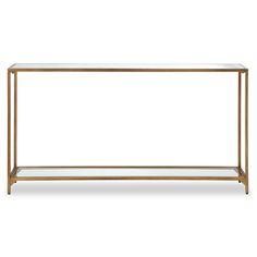 the golden console table with glass shelves on each side and an open shelf below it