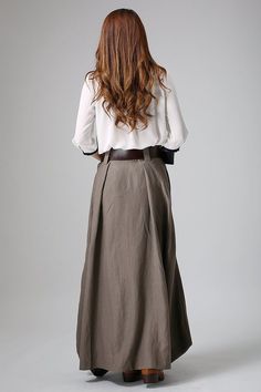 Long linen skirt maxi skirt for women brown skirt pleated | Etsy Beige Asymmetrical Pleated Maxi Skirt, Beige Pleated Asymmetrical Maxi Skirt, Asymmetrical Skirt With Pockets In Relaxed Fit, Asymmetrical Maxi Skirt With Pockets, Asymmetrical Solid Skirt With Pockets, Solid Color Asymmetrical Skirt With Pockets, Solid Asymmetrical Skirt With Pockets, Brown Gathered Flared Maxi Skirt, Casual Brown Asymmetrical Skirt