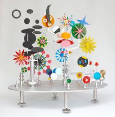 a table topped with lots of colorful objects