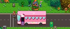 a pink bus driving down a street next to a lush green field and forest filled with animals