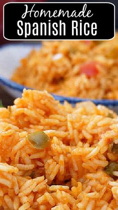 two bowls filled with spanish rice on top of a table