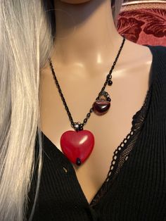 "Natural Red Jade, Bleeding Heart Necklace... With Blood Potion Bottle Red Jade The most Passionate and Stimulating Stone, A Stone of Love, and encouraging Love Energies.. Wear Red Jade to increase your Abundance, and Prosperity.. Leadership skills enhanced.. Ultimate Protection Their beautiful Natural Red Jade Is Big, measures 40mm The Black Stainless Steel Chain ( adjustable ) Measures 26\" With Glass.. Blood Drops" Red Heart Charm Necklace For Wedding, Spiritual Heart Beads Necklace With Heart Pendant, Red Pendant Necklace For Valentine's Day, Red Heart Cut Necklace For Wedding, Red Necklaces For Valentine's Day, Red Necklace For Valentine's Day, Red Spiritual Necklace With Heart Beads, Spiritual Red Necklace With Heart Beads, Valentine's Day Red Heart Necklace