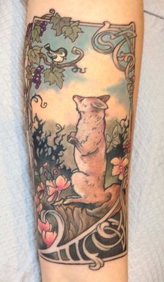 a bear tattoo on the arm and leg