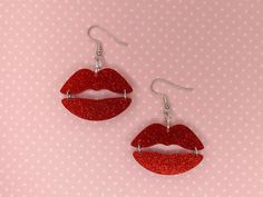 "This pair of fun acrylic Lips earrings are perfect for Valentine's Day or every day! They are available in the gloss or glitter acrylic color of your choice . Each pair is custom laser-cut in our studio to order. They are incredibly light and comfortable for all-day wear. Each earring is approximately 2.625\" long and 1.5\" wide. The earrings are hung on hypoallergenic, surgical stainless steel French ear wires. If you prefer, the ear wires can be changed to sterling silver for an additional $2 Laser Cut Acrylic Earrings, Acrylic Christmas Earrings, Laser Cut Acrylic Ideas, Acrylic Earrings Laser Cut, Lips Earrings, Lip Earrings, Laser Cut Jewelry Acrylic, Laser Cut Jewelry, Laser Cut Earrings