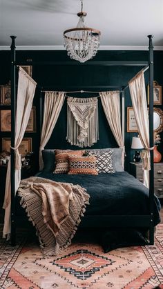 a bedroom with a canopy bed, chandelier and rugs on the floor