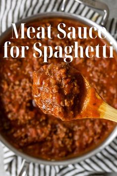 a spoon full of meat sauce with the words meat sauce for spaghetti on it in white lettering