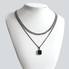 A timeless, durable, and water-safe stainless steel necklace set that won't tarnish, even with exposure to water - a must-have for any man's collection! 💎Free shipping on all orders💎Waterproof and non-tarnish💎Packaging that is ready to offer as a gift💎Customizable chain lengths A versatile and classic necklace set for men Unlock endless style options with this one-of-a-kind pendant necklace and curb chain necklace set! With this set, you'll get two necklaces with the potential to create mult Layered Necklaces Silver Men, Men Necklace Silver With Stone, Men Necklace Black, Mens Chains Silver Men Necklace, Square Pendant Necklace, Popular Necklaces, Indian Bridal Jewelry Sets, Mens Silver Chain Necklace Jewelry1000.com, Silver Chain For Men