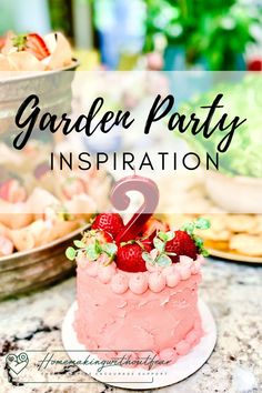 a pink cake with strawberries on top and the words garden party inspiration in front of it