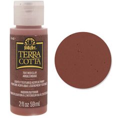 a bottle of terra cota paint with brown pigment on the bottom and white background