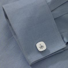 Highly polished and plated in genuine rhodium, these classic cuff links feature a Masonic emblem, accented with blue enamel.Each measures ⅝ x ⅝ x ¾"Plated base metalClean with polishing clothJewelry Closure: Toggle ClaspMetal Color: Silver ToneBase Material: 100% BrassCare: Spot Clean, Wipe CleanMetal: BrassCountry of Origin: Made in US White Gold Sterling Silver Cufflinks For Business, Formal White Gold Sterling Silver Cufflinks, Modern Cufflinks For Father's Day Business Occasions, Modern Cufflinks For Business And Father's Day, Adjustable Cufflinks For Business On Father's Day, Modern Father's Day Cufflinks For Business, Modern Cufflinks As A Gift, White Gold Cufflinks For Anniversary, Classic Blue Jewelry For Business