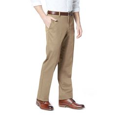 Easy care, easy wear. Khakis that make looking good look easy with a super soft feel and added stretch for all-day comfort. Sits at the waist, room in the thigh with a straight leg openingZipper fly with button closure All Motion Comfort waistband No Wrinkle technologySingle welt button-through back pocketsStretch fabrication 64% Cotton, 34% Polyester, 2% ElastaneMachine Washable Imported Classic Khaki Pants, Classic Full Length Khaki Pants, Classic Full-length Khaki Pants, Khaki Straight Dress Pants For Business Casual, Business Casual Khaki Pants With Belt Loops, Classic Khaki Work Pants, Classic Khaki Straight Cargo Pants, Khaki Straight Dress Pants With Welt Pockets, Classic Khaki Wide Leg Dress Pants