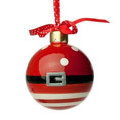 a christmas ornament hanging from a red ribbon