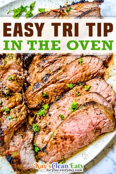 steak on a plate with parsley in the oven text overlay reads easy tri tip in the oven