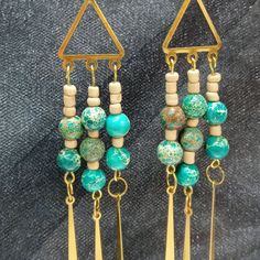 Green Turquoise And Cream Glass Beads With Brass Findings And Dangles. Turquoise Chandelier Drop Earrings With Colorful Beads, Adjustable Beaded Turquoise Chandelier Earrings, Turquoise Dangling Bead Drop Earrings, Adjustable Green Chandelier Earrings With Dangling Beads, Adjustable Green Beaded Earrings With Natural Stones, Turquoise Dangling Beaded Earrings, Adjustable Turquoise Chandelier Earrings With Dangling Beads, Green Beaded Dangle Earrings With Natural Stones, Turquoise Dangle Beaded Earrings