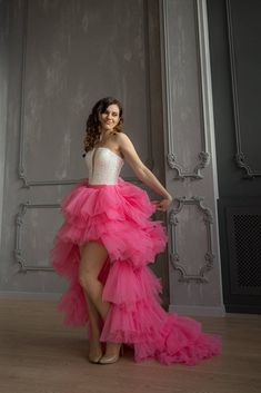 Hot Pink Tulle Skirt, High Low Tiered Skirt, Bridal Gown Flounce tulle high low skirt with train made of soft tulle. Band is satin.  Color: hot pink Assymethrical cut Skirt is possible in different colors. Contact me about color you wish.  Dress is fully handmade, so some details can be different from those you see on photo. As each dress is unique. PROCESSING AND SHIPPING TIME After payment is received dress will be ready to ship in 5 business days. I provide worldwide shipping. All items are s Maxi Skirt Photoshoot, Hot Pink Tulle Skirt, Formal Maxi Skirt, Skirt Photoshoot, High Low Tulle Skirt, Train Skirt, Bridesmaid Skirt, Bridesmaid Skirts, Pink Tulle Skirt