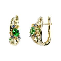 Earrings Yellow Gold 14 K Diamond 30-Round 57-0,08-5/5A Tsavorite 1-Round-0,03 1/2A Blue Sapphire 6-Round-0,13 Т(4)/2A Yellow Sapphire 6-Round-0,09 1/2A Tsavorite 2-Oval-0,54 1/2A Weight 3.6 grams With a heritage of ancient fine Swiss jewelry traditions, NATKINA is a Geneva based jewellery brand, which creates modern jewellery masterpieces suitable for every day life. It is our honour to create fine jewelry, and it’s for that reason that we choose to only work with high-quality, enduring materia Formal Tsavorite Earrings Fine Jewelry, Luxury Green Multi-stone Earrings, Yellow Gold Tsavorite Gemstone Earrings, Yellow Gold Tsavorite Earrings Fine Jewelry, Tsavorite Earrings For Anniversary In Fine Jewelry Style, Luxury Green Emerald Earrings, Green Fine Jewelry Cluster Earrings For Formal Events, Luxury Green Earrings For May Birthstone, Fine Jewelry Green Cluster Earrings For Anniversary