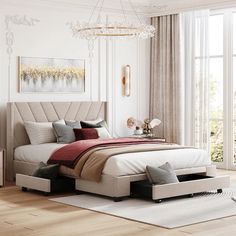 a bedroom with white walls and wooden flooring has a large bed in the center