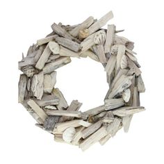 a white wreath made out of driftwood on a white background with clippings