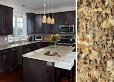 a kitchen with granite counter tops and dark wood cabinets, along with an island in the middle