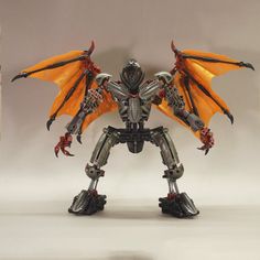 a robot that is standing up with wings