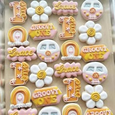 decorated cookies in the shape of letters and numbers