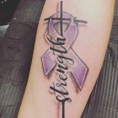 a tattoo with a cross and a purple ribbon on it that says, hope for all