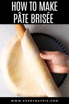 a person holding a piece of bread on top of a black plate with the words how to make pate brise